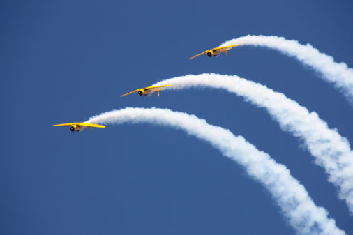 Harvard aircraft flying in formation